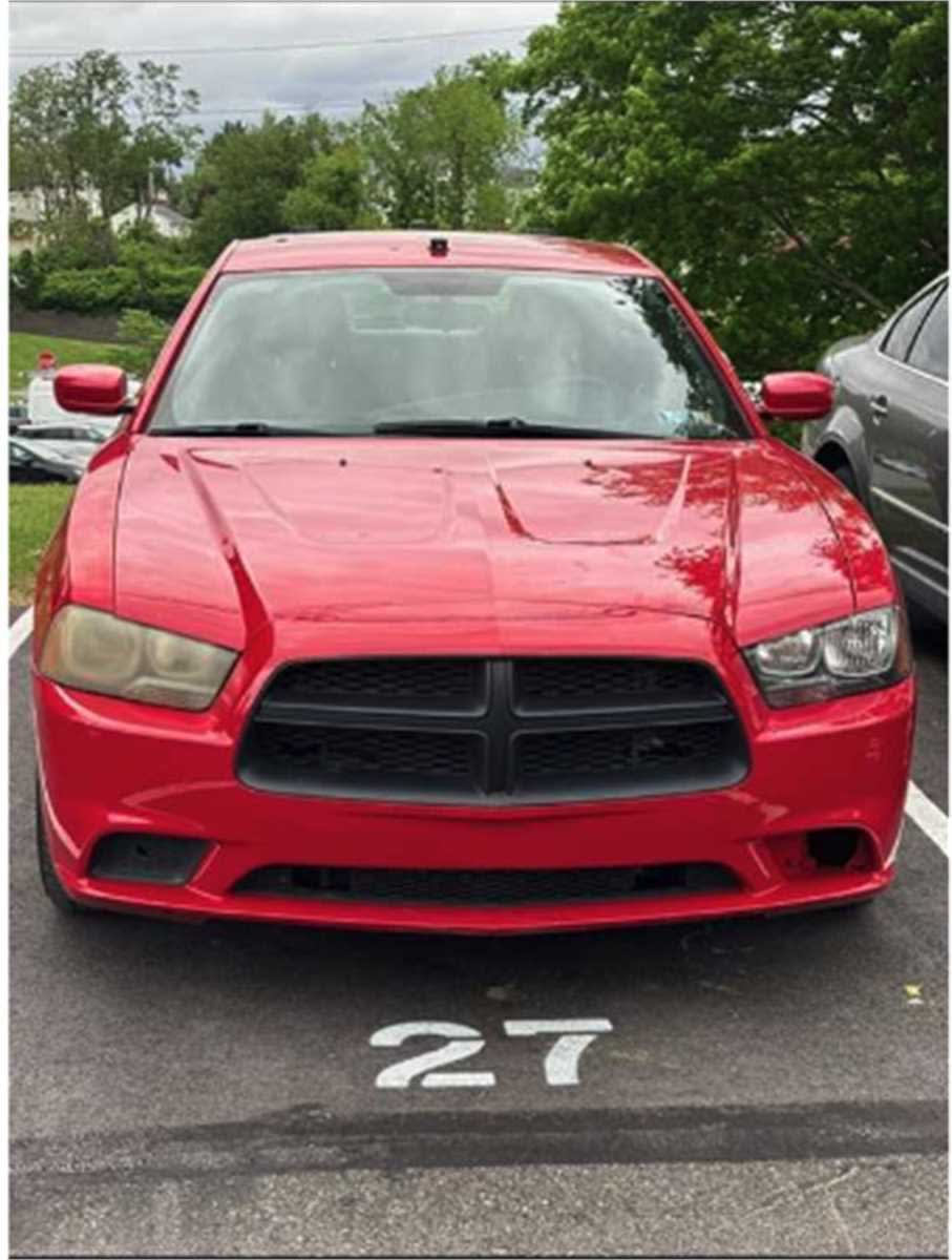 A red modern Charger, for sale on Municibid.