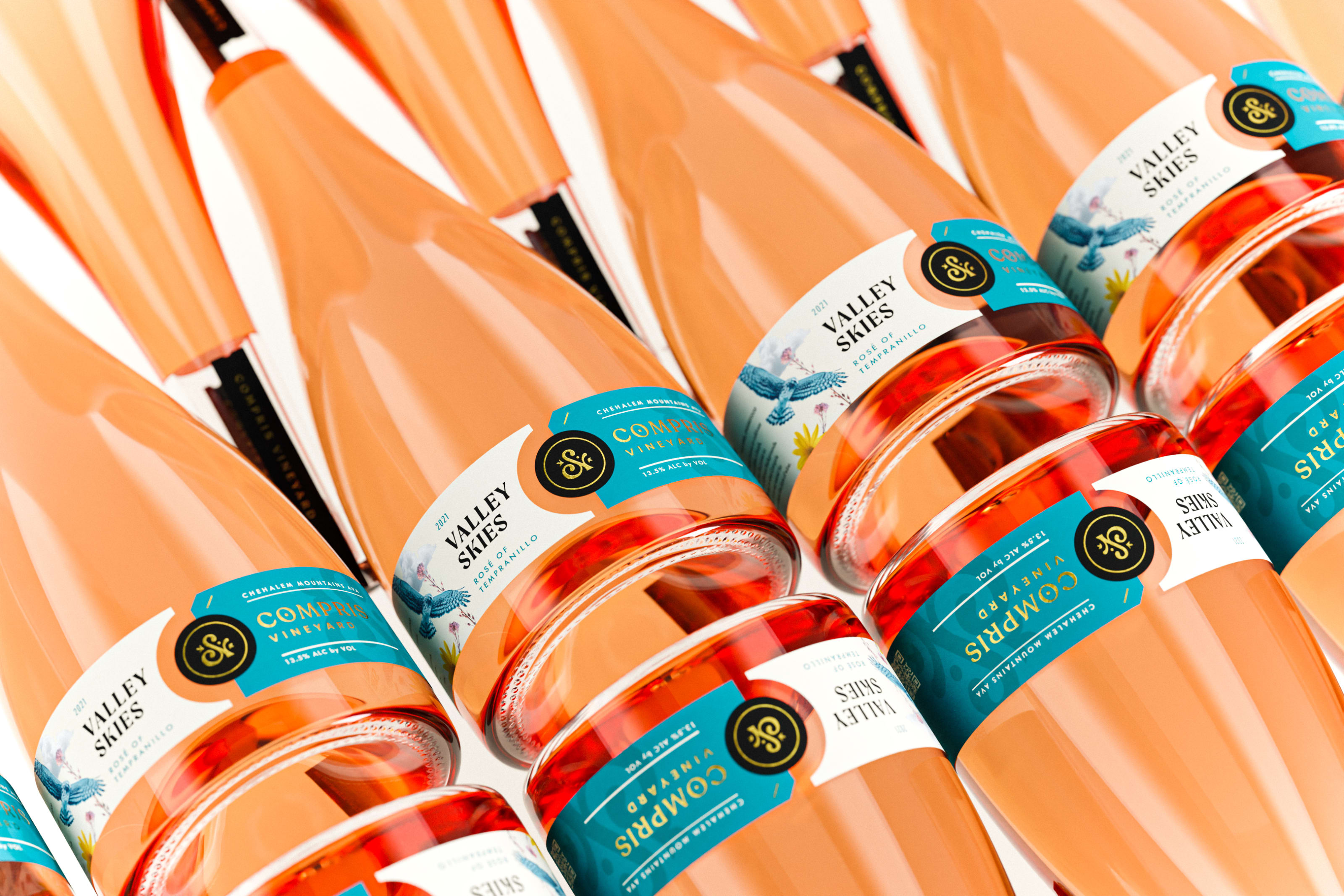 compris wine bottles at an angle