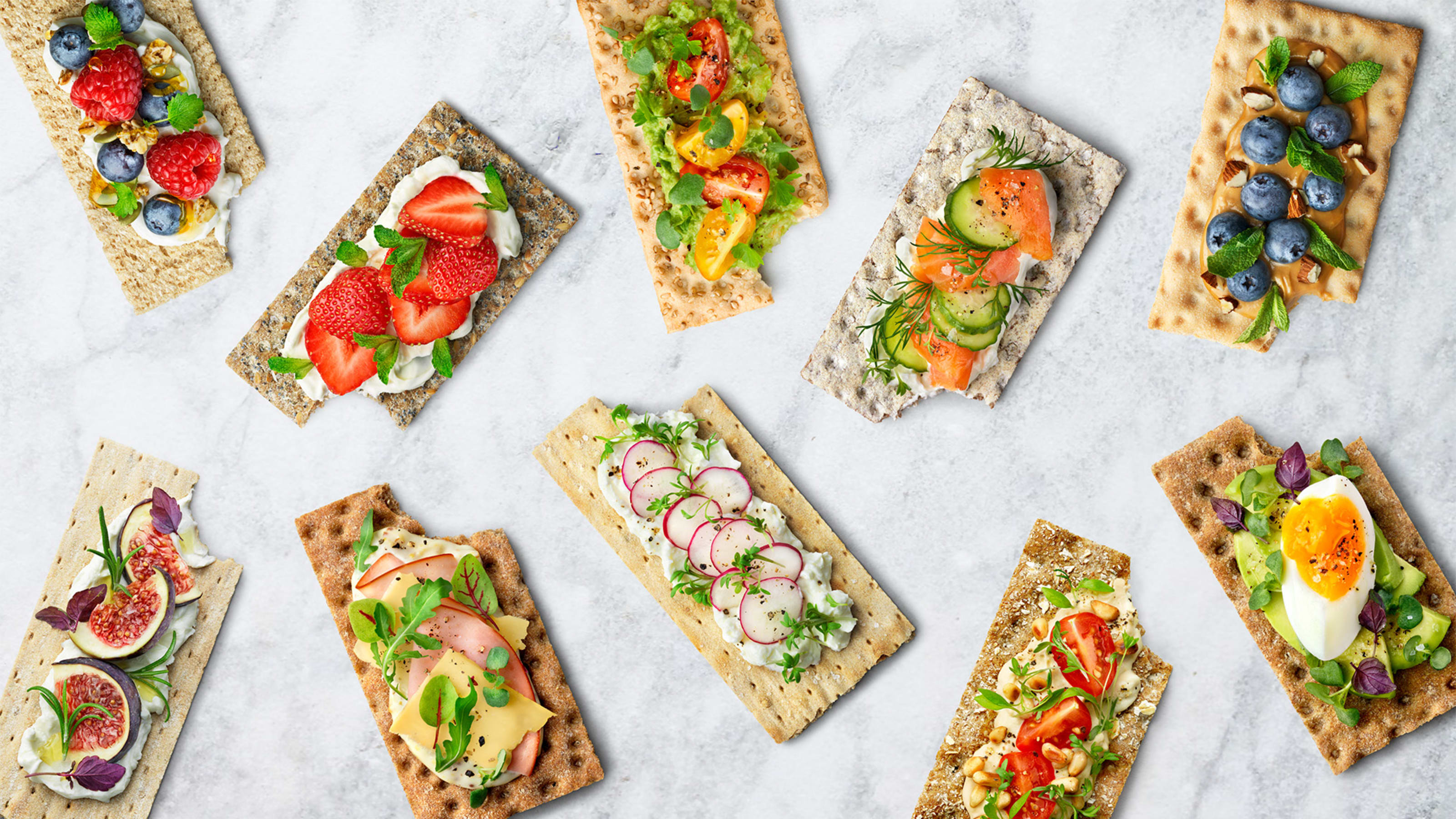 Wasa crackers laid out with food on them
