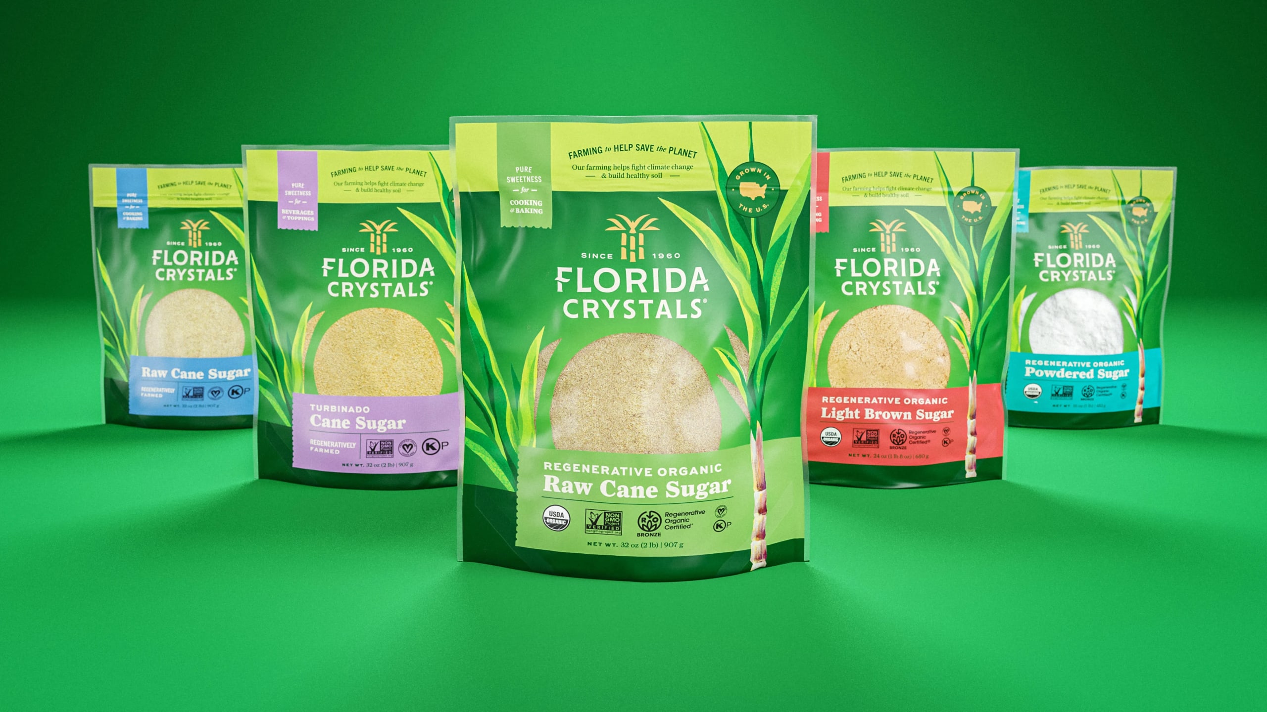 Florida Crystals packaging lineup featuring regenerative organic sugar products including Raw Cane Sugar, Turbinado Cane Sugar, Light Brown Sugar, and Powdered Sugar, set against a vibrant green background, emphasizing sustainability and quality.