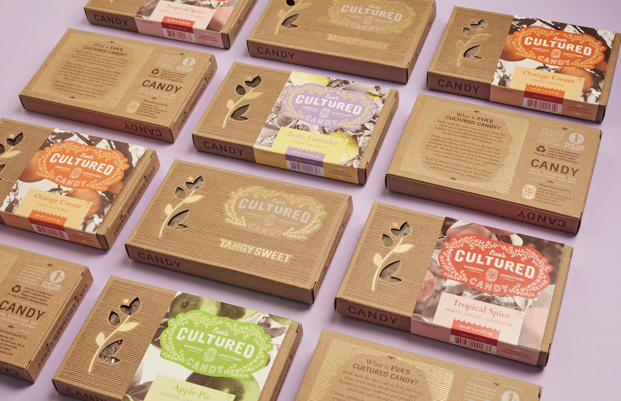 Eva's Cultured Candies packaging design featuring various flavors like Orange Cream, Zesty Lavender, and Tropical Spice, showcasing botanical elements and gold foil accents on eco-friendly boxes.