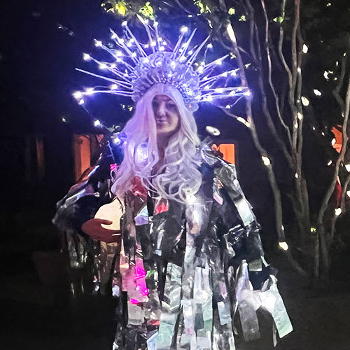 Roaming performer Allison Mahaynee in Intergalactic Costume by Justin Young with Headpiece by Marina Polakoff
