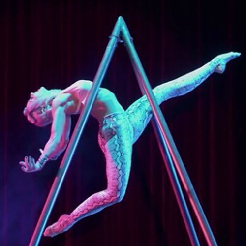 Maggie Power performing on her original pyramid apparatus