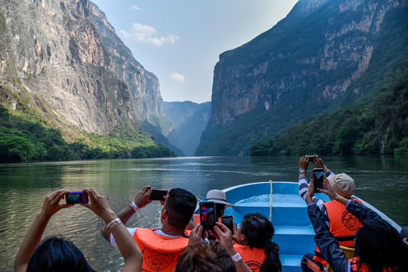 Tourists experiencing a boat trip in Sumidero Canyon, one of the most iconic attractions of Chiapas, Mexico