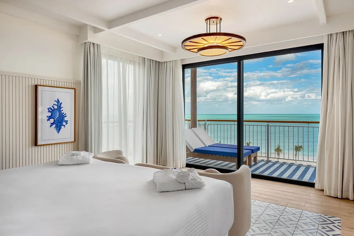 Modern outdoor terrace at Ocean Allure Costa Mujeres in Cancun, featuring contemporary lounge seating and architectural lighting, designed for upscale corporate cocktail receptions, evening networking events, and luxury MICE incentive gatherings.