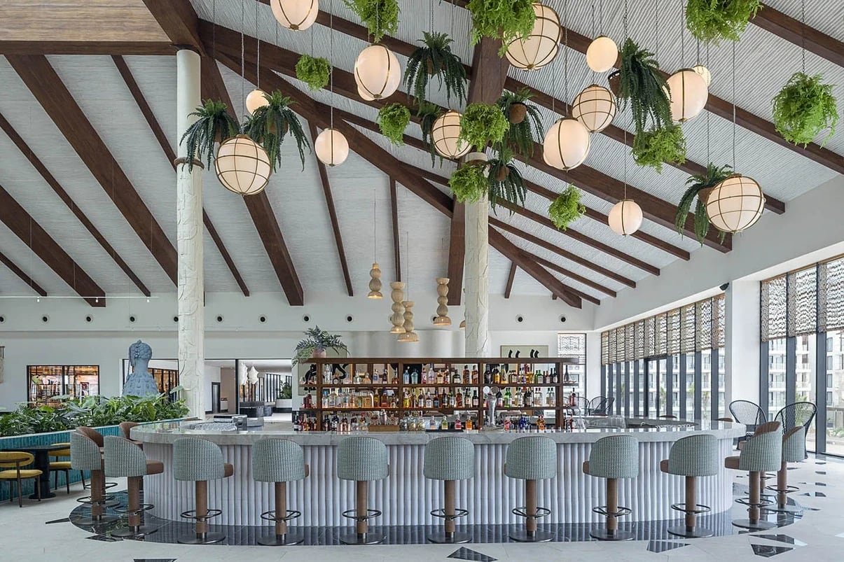 Interior of a luxury Privilege Master Suite at Ocean Allure Costa Mujeres, featuring a spacious living area, ocean-inspired design, and modern executive amenities, perfect for high-level corporate incentive travel and VIP business event accommodations.