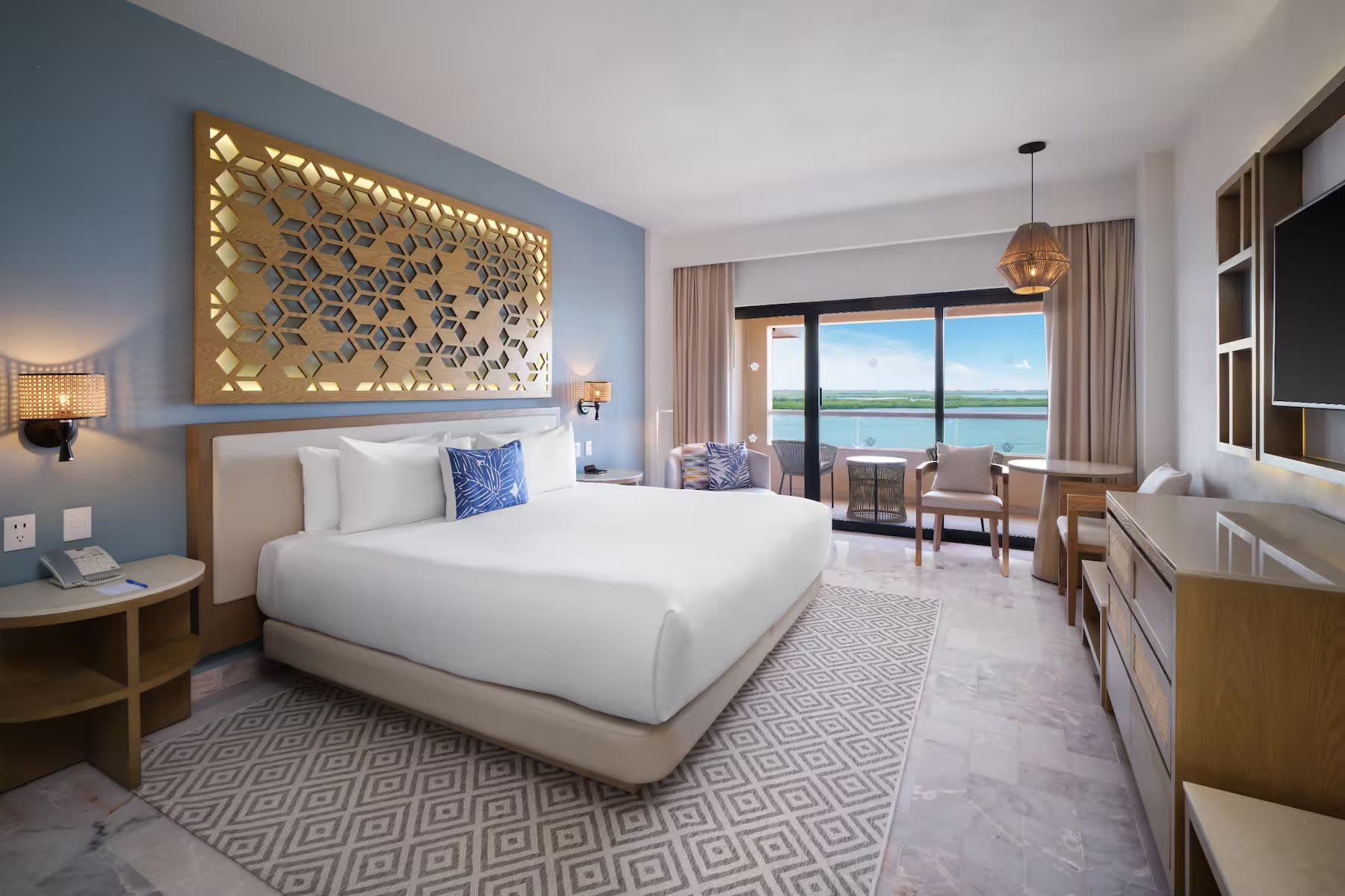 A great perspective of the beachfront King Size Bedroom at the Wyndham Grand Cancun All Inclusive Resort & Villas, showcasing its great location & views and its beachfront terraces that serve as premium outdoor venues for corporate networking and MICE incentive events.