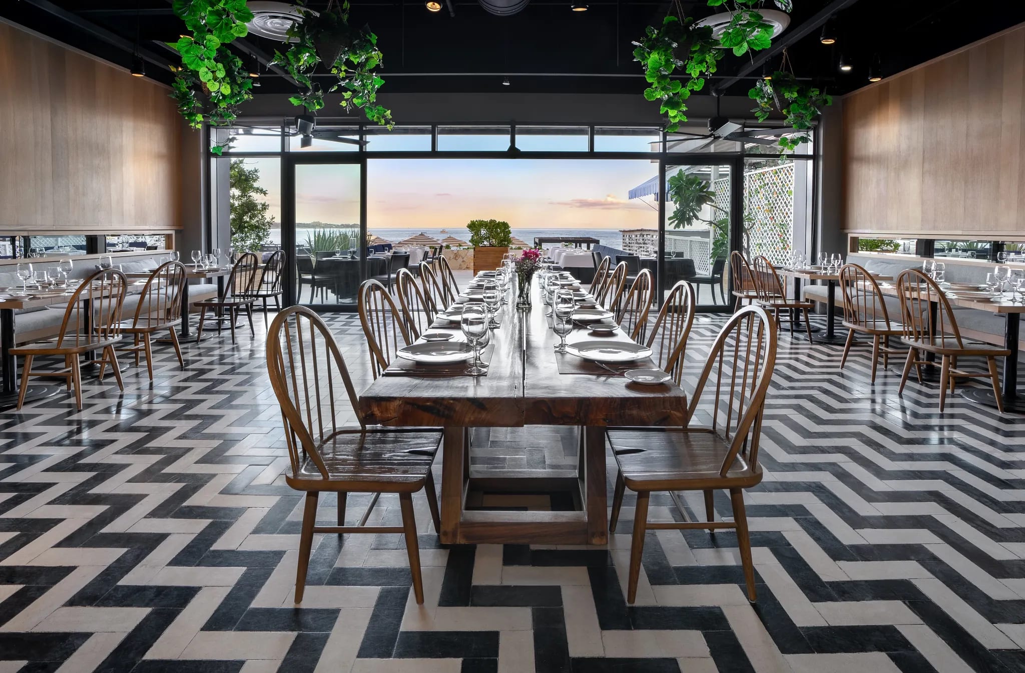 Stylish dining venue at Breathless Cabo San Lucas Resort and Spa with ocean views, ideal for MICE group dinners, networking receptions, and incentive travel experiences.