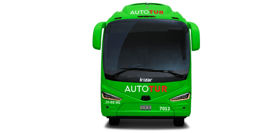 Front-view of a bright green Irizar luxury coach bus with "AUTOTUR" logo, showcasing its modern design and headlights. Used for high-end MICE event group movements, ensuring a professional and impressive arrival for all delegates. Keywords: Executive motorcoach, MICE transport fleet, professional bus service, convention logistics, delegate arrival.