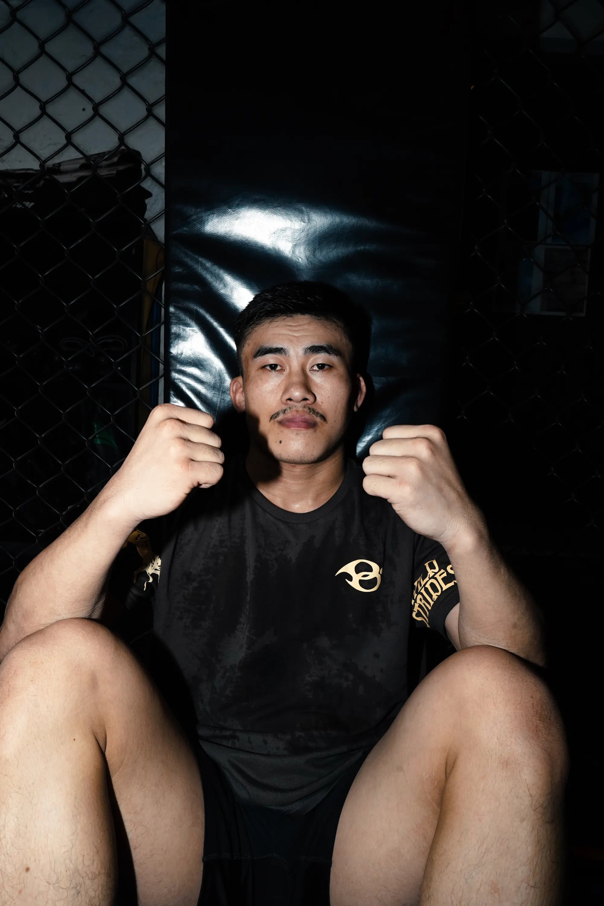 The Wild Strides Tee in Ash, worn, ringside