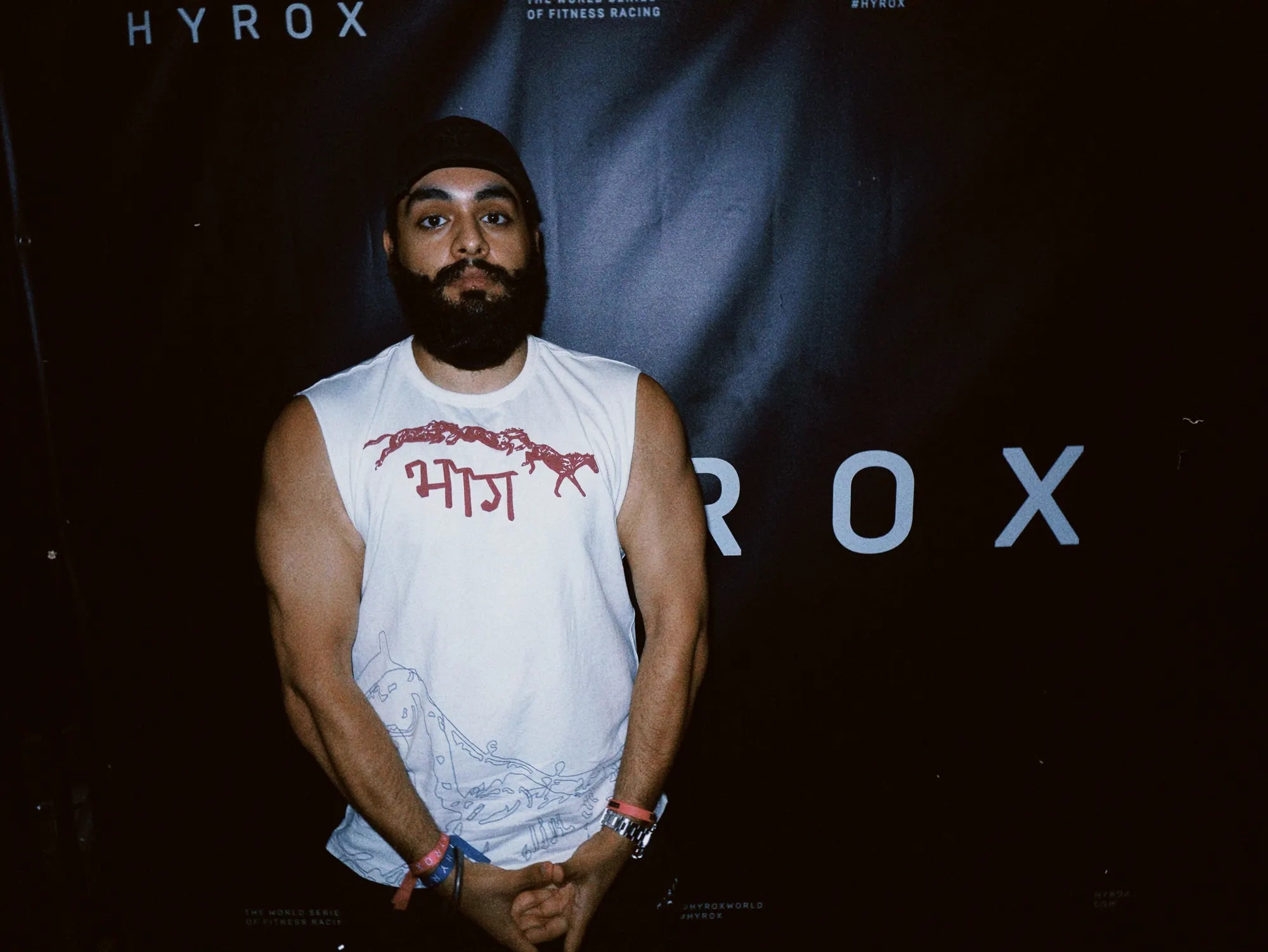 The भाग Muscle Tank in Bone, worn at HYROX