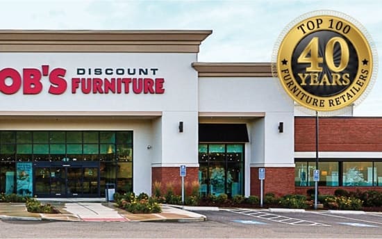 Bob's Discount Furniture storefront with large red and black signage, featuring a 40 years Top 100 Furniture Retailers gold emblem.