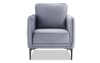 Light gray upholstered accent chair.