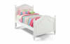 White panel bed with pink and blue striped quilt.