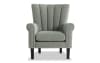Light green upholstered tufted accent chair perfect for small bedrooms.