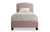 Pink twin size upholstered panel bed.