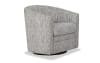 White and navy abstract upholstered swivel accent chair.