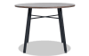 Brown and black round dining table.