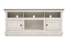 White TV stand with two storage cabinets.