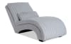 Gray upholstered chaise lounge.