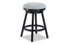 Gray backless upholstered counter height adjustable swivel stool.