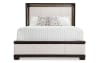 Ivory and dark brown panel bed with illuminated headboard.