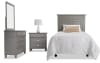 Gray bedroom set with panel headboard, dresser, mirror, and nightstand.