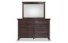 Brown 9 drawer dresser with mirror.