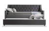 Gray upholstered tufted daybed with pull out trundle bed.
