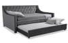 Gray full size upholstered tufted daybed with pull out trundle bed.