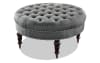 Gray round tufted ottoman