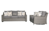 Gray wicker outdoor sofa and loveseat with white patterned pillows.