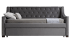 Gray upholstered daybed with button tufting and a pull out trundle.