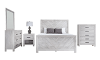 Distressed white bedroom set with dresser, mirror, chest, and nightstand sold together.