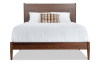 Full size brown platform bed.