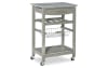 Gray kitchen cart on wheels and 2 shelves.