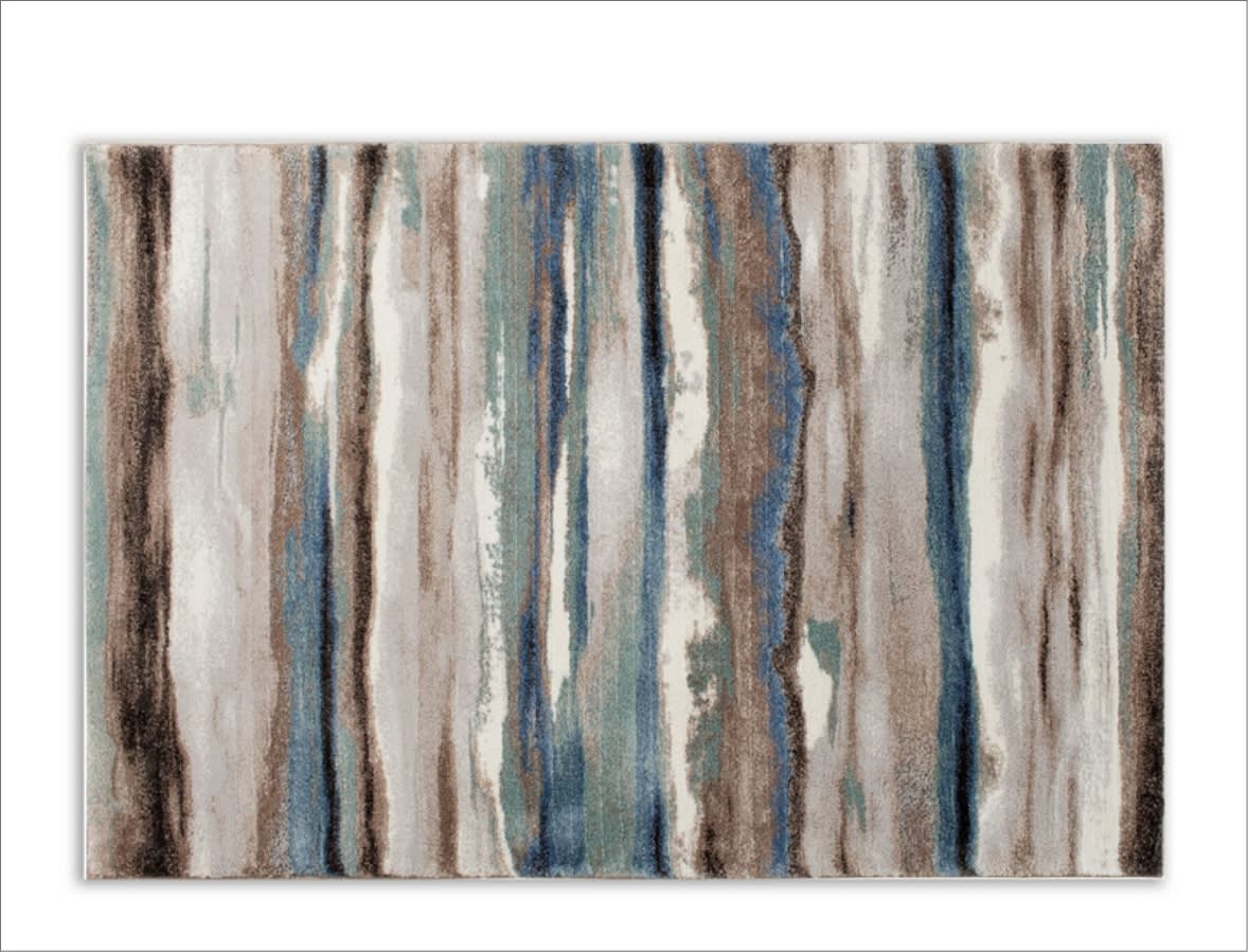 Abstract area rug with blue, brown, gray, and white tones.