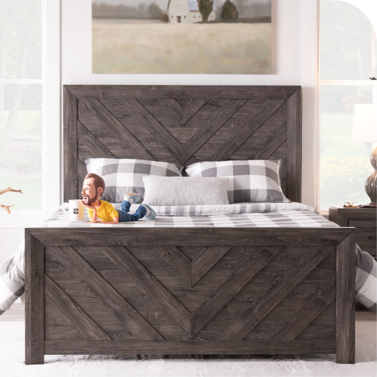 Brown panel bed with little bob laying down enjoying beverage in a mug