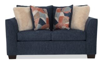 Brynn Navy 64'' Loveseat in transitional style with navy polyester fabric upholstery, Bob-O-Pedic memory foam cushions, and decorative accent pillows.