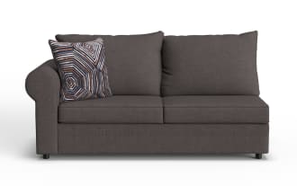 Dark gray fabric loveseat sofa with rounded armrest on the left, two back cushions, and a decorative geometric patterned throw pillow.