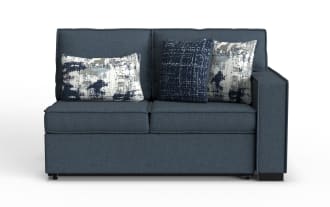 Modern navy blue fabric loveseat sofa with straight arms, two seat cushions, and three decorative throw pillows in patterned and textured designs.