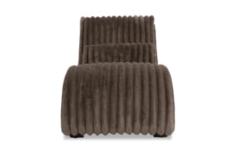 Modern chaise lounge chair upholstered in soft, ribbed brown faux fur fabric with a curved, cushioned design for comfortable seating.