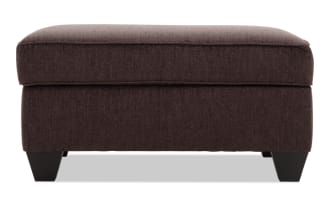Transitional Kylie Chocolate Storage Ottoman in brown polyester fabric with cushioned top, no-sag spring seating, and hidden storage space.