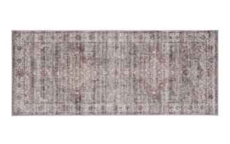 Vintage-style rectangular area rug runner with muted gray, beige, and rust tones, featuring a distressed floral medallion pattern and intricate border design.