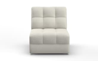 Beige upholstered armless accent chair with tufted back and seat cushion, featuring a modern, minimalist design and soft fabric texture.