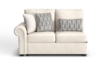 Beige Playlist Max left arm facing pop-up sleeper loveseat with traditional rolled arm, polyester fabric, memory foam cushions, patterned throw pillows, and built-in USB/USB-C ports.