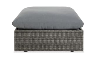 Dream Gray Wicker Outdoor Ottoman with oversized reversible gray polyester cushion, all-weather wicker, and rust-free aluminum frame from Dream Outdoor collection.