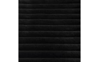 Sofia 5' x 7' black solid washable rug with ultra-plush medium pile, transitional style, made of soft polyester fabric for a cloud-like barefoot feel.