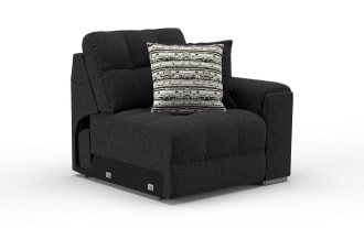 Modern black fabric sectional sofa corner piece with tufted cushions and two decorative pillows, ideal for contemporary living room seating.