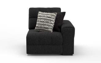 Modern black fabric sectional sofa corner piece with tufted cushions and two decorative pillows, ideal for contemporary living room seating.